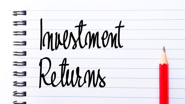 Investment Returns written on notebook page with red pencil on the right