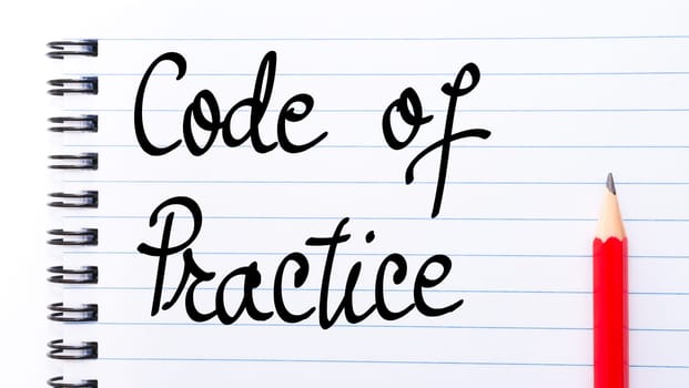 Code Of Practice written on notebook page with red pencil on the right