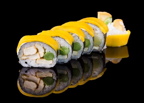 Sushi set over black background