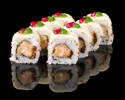 Sushi set over black background