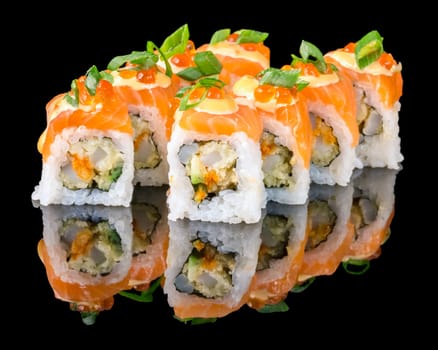 Sushi set over black background