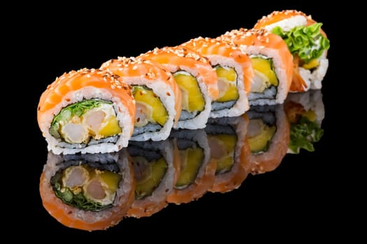Sushi set over black background