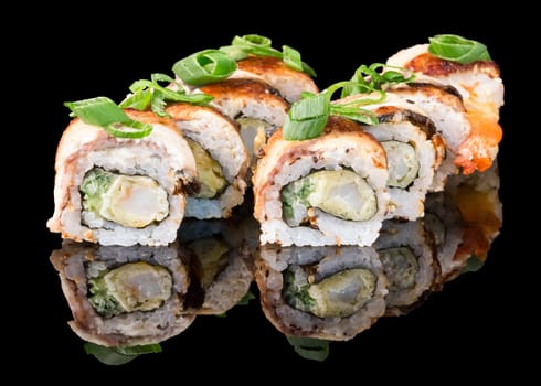 Sushi set over black background