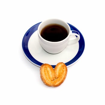 cup of coffee on a saucer and one cookies in front, the isolated image, a subject drinks