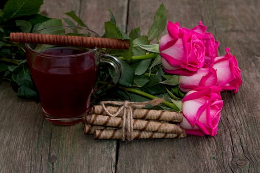 beautiful still life, tea, roses and linking of cookies, subject holidays, food and drinks