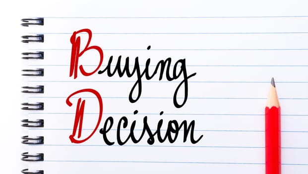 BD Buying Decision written on notebook page with red pencil on the right