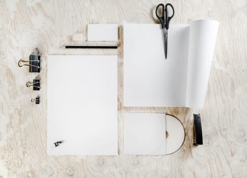 Blank stationery set on wooden table background. Blank ID template. Mockup for branding identity for designers. Mock-up for your design.