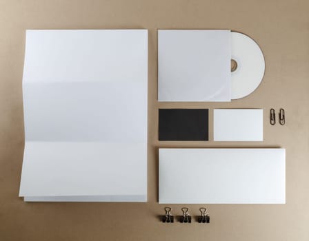 Blank corporate identity set on a table. Top view.