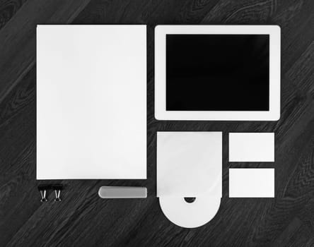 Photo of blank stationery set on wooden background. Corporate identity template. Mock-up for branding identity. Template for ID. Top view.