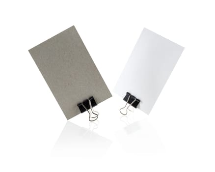 Two blank business card isolated on white background with reflection. Clipping path.