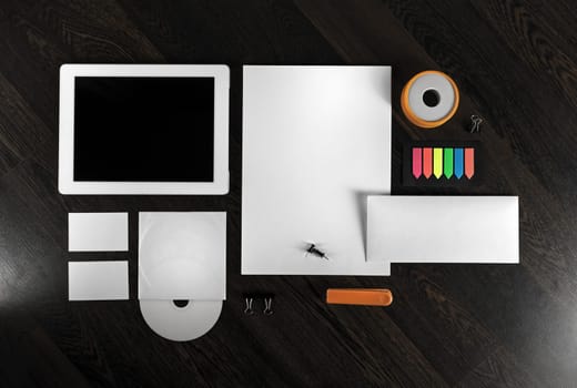 Corporate identity template on wooden background. Top view.
