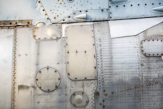 Vintage metal background. Old weathered metallic background. Vintage metal texture with rivets.