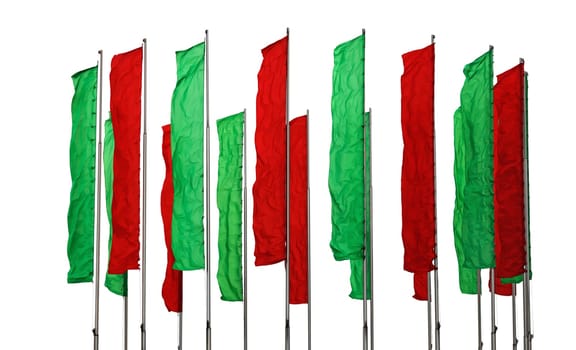 Several flagpoles with vertical green and red flags