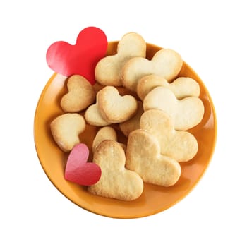 Cookies-hearts and valentines in a plate on a white background. Isolated with clipping path. Top view.