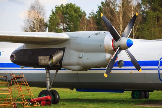 Engine and propeller of an old vintage airplane. Selective focus on propeller.