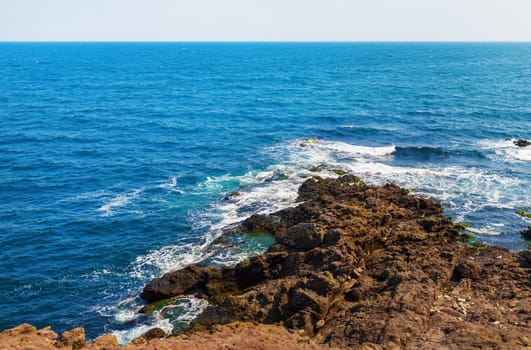 Bright sunny day on the coast of the Black Sea. Picturesque seascape.
