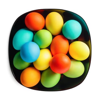 Colored Easter eggs on a black plate on white background. Isolated with clipping path.