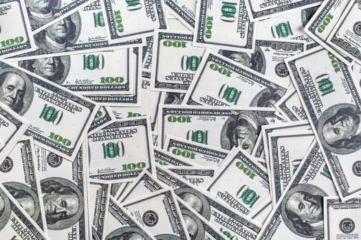 Fake money background. Background from a variety of one hundred dollar bills.