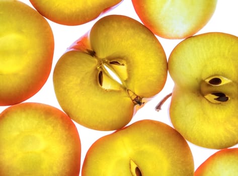 Fresh delicious apples, cut into slices. Close up.