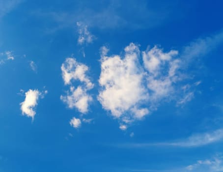 White cloud in the blue sky background. Sunny summer day.