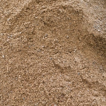 Close-up of sand texture. Coarse sand grains background.
