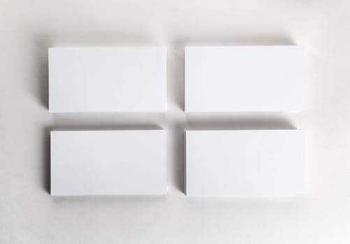 Blank business cards on the table. Template for ID. Top view.