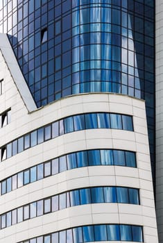 MINSK, BELARUS - MAY 03, 2016: Renaissance Minsk Hotel - this is the first hotel of the well-known international hotel chain Marriott in Belarus. Close-up of modern building of steel and glass.