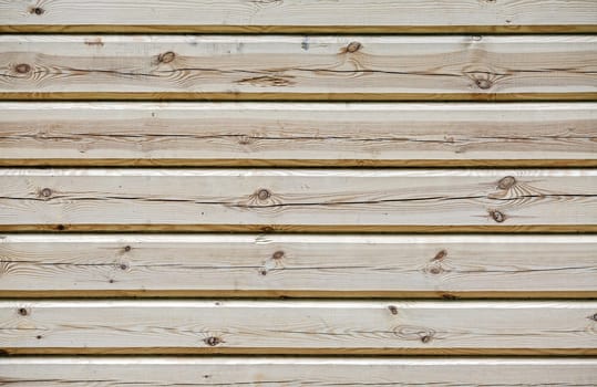 Background from log wall. Wall of wooden logs.