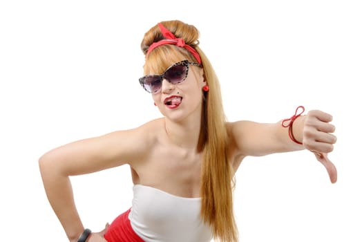 Pretty girl pin-up with the thumb down isolated on white background