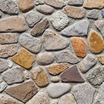 Stone wall texture. Old vintage stone wall of large boulders.