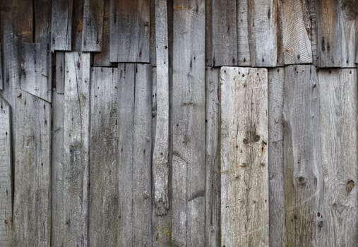 Old weathered wooden planks from the weather.