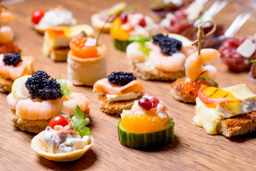 Exquisite selection of luxury canapes, appetizer ready to be served for events, celebrations or other occasion