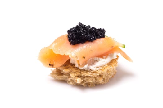Smoked Salmon Appetizer with Cream Cheese and Caviar, isolated on white