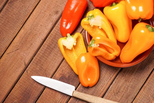 Small bell peppers in red and orange