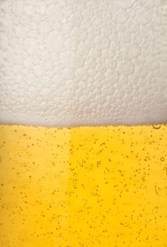 Close up of beer pearls, adding up to froth