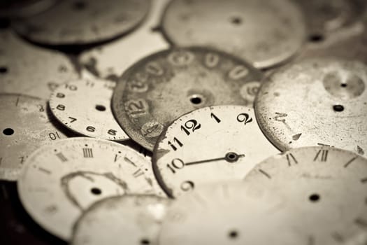 Horizontal top view of a set broken hand watches