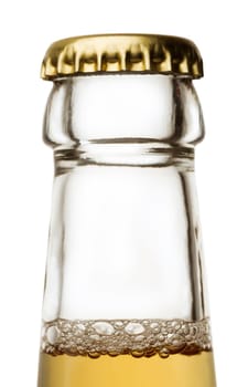 Beer bottle close up isolated on white with a bit of froth and golden cap
