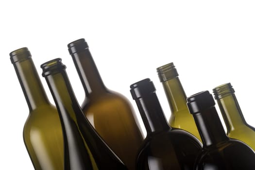 Empty wine bottles isolated on white background.