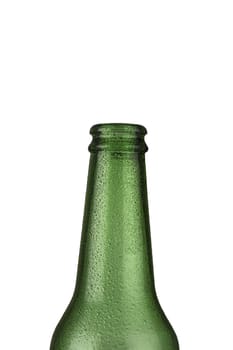 A green empty glass beer bottle with water droplets on it isolated on white background