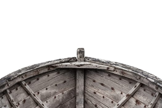 Horizontal photo of an old fishing wood boat with rusted nails isolated on white background