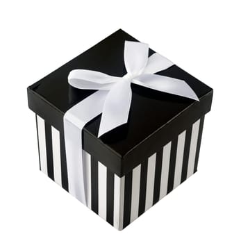 Closed box with black and white stripes and white ribbon isolated on white background..