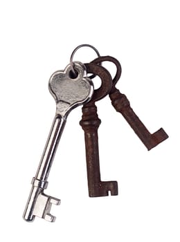 A silver key and two rusted ones.
