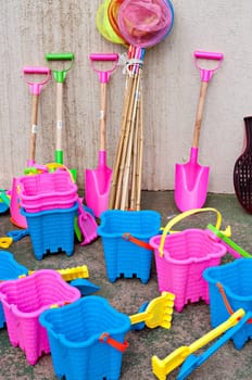 Buckets, spades, nets and bats for sale at the beachfront