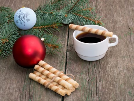 coniferous branch, linking of cookies and coffee, still life subject Christmas and New Year