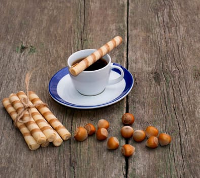 coffee, linking of cookies and forest nutlets on a table, a subject hot drinks and sweets