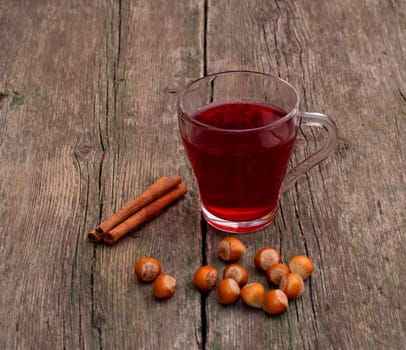 cinnamon, cup of tea and forest nutlets, subject hot drinks and sweets