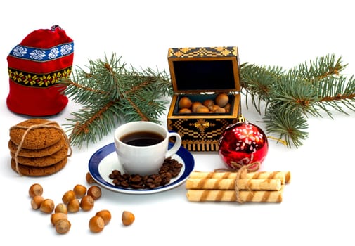 red bag, coffee, fir-tree branch, casket and forest nutlets, subject hot drinks and sweets, holidays Christmas and New Year