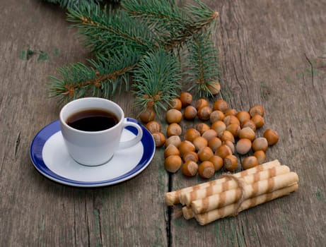 coffee, fir-tree branch, baking and forest nutlets, subject holidays Christmas and New Year