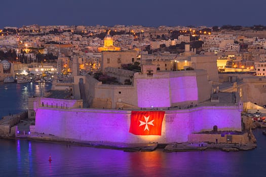 Violet laser projection over Fort Saint Angelo