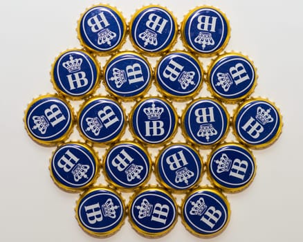 Munich, Germany - June 10, 2016: Many bottle caps of beer from Bavarian brewery Hofbrau Munich